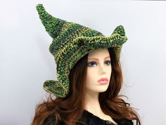 "This custom color forest witch hat is firmly shaped but soft enough to fold for travel. The brim is naturally wavy, but you can still play with where you want the waves to be exaggerated. The tip is sewn with a tuck to keep the point crooked, and the double thick yarn makes this hat firm enough to hang from a peg or sit on your dresser. You can add your own seasonal touch with pins, buttons, beads, flowers, etc through the crocheted stitching. This hat will take you through Fall, Winter, and Sp Green Festival Cap, Green Curved Brim Hat For Festivals, Green Sun Hat For Festival, Green Wide Brim Hat For Festival, Green Bohemian Brimmed Sun Hat, Whimsical Bucket Sun Hat, Whimsical Adjustable Brimmed Crochet Hat, Green Brimmed Crochet Hat For Outdoor, Green Sun Hat For Festivals