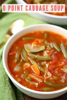 two bowls of vegetable soup with spoons in the background and text overlay that reads 10 point cabbage soup