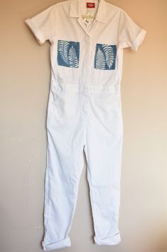 White Dickies Jumpsuit with Cyanotype fern print pocketsWomen fit with cinched waist in backTagged size M (see measurements)65% polyester 35% cottonTwo front pockets and two back pocketsZipper and snap buttons Dickies Jumpsuit, White Dickies, Finger Crochet, Painted Denim, Leftover Fabric, Upcycled Fashion, Champion Hoodie, Mesh Sleeves, White Jumpsuit