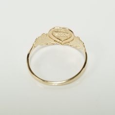 "Thanks for shopping our vintage estate store. We tend to sell well below wholesale and truly hope you enjoy all of our items. Many of the items are one of a kind, so please enjoy scrolling through the pictures and hopefully something will catch your eye. Brown spots are from camera or reflections. Estate 14k yellow gold monogram cursive capital M heart ring. Custom made ring for our shop. Ring size: 3 Setting: 7.5mm 1/4\" to 3/8\" Band width: 1.4mm Weight: 1.09 grams Marked 14k and it's sweet. Cursive M, Beach Rings, Antique Style Rings, Gold Monogram, Brown Spots, Cute Rings, Signet Ring, Antique Style, School Stuff