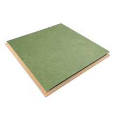 a sheet of green paper on a white background