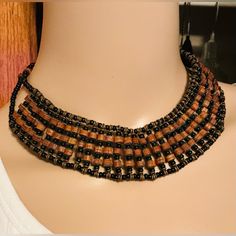 This Beautiful Choker Necklace Is A Stunning Piece Of Handmade Jewelry Featuring Intricate Beaded Work. The Necklace Consists Of Multiple Rows Of Beads In Earthy Tones, Predominantly Brown And Dark Shaded Black Beads, Giving It A Rustic Yet Elegant Appearance. Crafted With Meticulous Attention To Detail, The Beads Are Woven Together To Create A Layered, Textured Design That Lies Gracefully Around The Neck. Designed For Women Who Appreciate Unique, Handcrafted Accessories, This Choker Seamlessly Everything I Am, Beaded Work, Celtic Knot Necklace, Apatite Necklace, Beautiful Chokers, Tigers Eye Necklace, Formal Outfits, Handcrafted Accessories, Textured Design