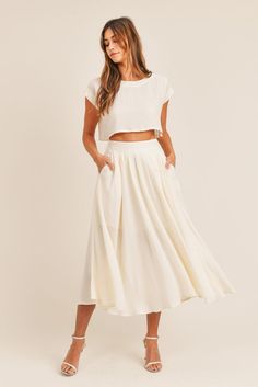 Linen was made for summery weather, and this classic fit-and-flare skirt and crop top set lets you enjoy every sunny day in feminine style. This is a Pre-Order item. Estimated ship time for size S/M is mid July. M/L is available for immediate shipping. Please go ahead and order to reserve yours. • Linen Like Fabric• Midi Flare Skirt• Lined• Side Pockets• Cap Sleeves Summer Two Piece Outfits, Night Skirt, Flowy Maxi Skirts, Fit And Flare Skirt, Crop Top Set, Midi Flare Skirt, Puff Sleeve Crop Top, Flowy Skirt, Mode Inspiration