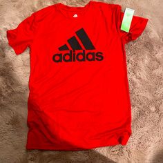 Red Aeroready Adidas Teen T. Sporty Red Shirt For Summer, Adidas Red Short Sleeve T-shirt, Red Sports T-shirt For Spring, Adidas Red Crew Neck T-shirt, Red Adidas Crew Neck T-shirt, Red Adidas Short Sleeve T-shirt, Adidas Red Sporty Top, Red Adidas Sporty Top, Sporty Red Adidas Top