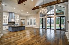 a large open floor plan with wood floors