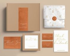 the wedding stationery suite is shown with matching envelopes, cards and other items