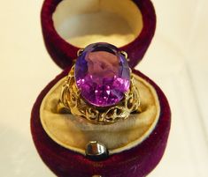 A fine solid 9ct gold oval cut real amethyst rng. the large oval amethyst is set in a decorative filigree open work mount, the amethyst measures an impressive 1.1cm wide x 1.5cm high. has full english hallmarks, for birmingham 2004. in excellent condition. ring size uk- n.1/2. box for display only but will come boxed Antique Oval Amethyst Ring, Antique Oval Purple Amethyst Ring, Victorian Style Oval Purple Amethyst Ring, Victorian Style Purple Oval Amethyst Ring, Oval Amethyst Ring With Intricate Design, Oval Purple Filigree Amethyst Ring, Oval Purple Amethyst Ring With Filigree, Purple Oval Amethyst Ring With Filigree, Purple Oval Filigree Rings