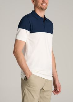 About Our Classic Color-Block Tall Men's Polo Shirt Update your tall men’s polo shirt collection with our new, color-block polo. Designed with classic polo features like a button placket, crisp collar and clean fit, this versatile shirt is ready for everything from casual Fridays to clubhouse Sundays. We’ve created this extra long polo shirt intentionally for men from 6’ to 7’1, so it has longer sleeves and an extended body tailored specifically for your frame. It’s built with stretch-infused co White Color Block Polo Shirt, White Color Block Collared Tops, White Collared Color Block Top, Casual Polo Collar Top With Contrast Color, Casual Color Block Cotton Polo Shirt, Casual Tops With Polo Collar And Contrast Color, White Color Block Cotton Polo Shirt, Navy Color Block Collared Top, White Color Block Short Sleeve Polo Shirt