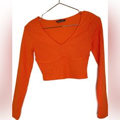 Brand New V Neck Fitted Crop Tee Color: Orange Size: Xs Brand: Shein Casual Orange V-neck Crop Top, Orange Stretch V-neck Top, Stretch Orange V-neck Top, Orange Ribbed Crew Neck Top, Trendy Fitted V-neck Crop Top, Casual Orange Ribbed Top, Trendy Orange Crop Top, Trendy Long Sleeve Orange Top, Orange Ribbed Tops For Spring