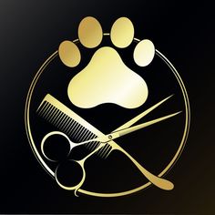 a pair of scissors and a comb are on a black background with gold paw prints