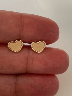 "14K Solid Gold Opaque Heart Studs | 14K Solid Gold Classy Heart Cut Screwback Studs | Gold Heart Earrings | Dainty Studs | Free Shipping Beautiful, elegant and classic heart cut studs ♦ Materials: 14K Gold ♦ Available colors: 14K Yellow Gold, it is a brushed opaque inner gold color ♦ Closure: Screw Backs ♦ Earrings Measurements: 8 Millimeters -------------------------------------------------- ♦ -------------------------------------------------- MATERIALS 14K Gold PRODUCTION TIMES Order processi Tarnish Resistant Heart Earrings For Valentine's Day, Gold Heart Charm Earrings In 14k, 14k Gold Tarnish Resistant Heart Earrings For Valentine's Day, Yellow Gold Double Heart Earrings For Valentine's Day, Yellow Gold Double Heart Earrings, Valentine's Day 14k Gold Tarnish-resistant Heart Earrings, Valentine's Day 14k Gold Heart Earrings Tarnish Resistant, Valentine's Day 14k Gold Tarnish Resistant Heart Earrings, Tarnish-resistant Yellow Gold Heart Earrings