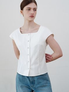 This is a comfortable and trendy top by ourcomos that is made out of high quality cotton and tencel blend fabric. With refined design detail with trendy look, it will stand out from your casual and feminine daily outfit.- Square neckline- Minimal and slim silhouette- Glossy buttons for cool and luxurious mood Versatile White Tops For Everyday Wear, Versatile White Top For Everyday, Versatile White Everyday Top, Elegant Cotton Top For Workwear, Modern Fitted Cotton Top, Classic Summer Workwear Tops, Versatile Everyday Cotton Blouse, Versatile Cotton Tops For Workwear, Fitted Cotton Top For Work