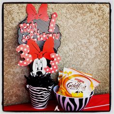 a minnie mouse birthday party with candy and treats