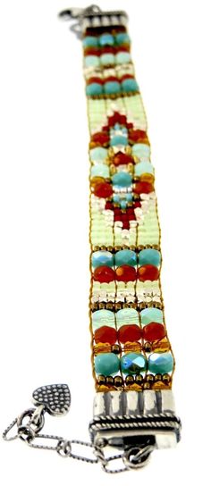 Chili Rose Beadz Bracelet by Adonnah Langer of Santa Fe, New Mexico FREE SHIPPING!-Delivery in less than 2 weeks customized for you! Following a woven bead tradition which goes back hundreds of years Adonnah Langer has been designing distinctive wearable art for over two decades. This rich bracelet illustrates the influence of Native American rug patterns in her design. Stripes of Czech fire polished beads and the finest quality Japanese seed beads are highlighted throughout. -All Sterling Silve Festival Turquoise Beaded Bracelets With Faceted Beads, Turquoise Beaded Bracelets With Faceted Beads For Festival, Artisan Beaded Turquoise Friendship Bracelets, Rich Bracelet, Rose Tiffany, Chili Rose, Native American Rug, Rug Patterns, Turquoise Bead Bracelet