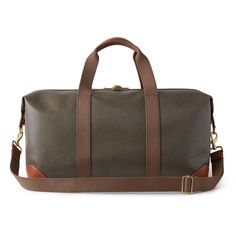 Nothing says 'classic Mulberry' like our Scotchgrain luggage collection. Its beautifully textured surface is accented by smooth leather trim. Travel pieces should be built to last, and look good while doing it. A timeless travel bag in a medium size, this clipper has two short handles and a detachable shoulder strap. Leather trim detailing Two canvas handles with leather detailing Detachable and adjustable canvas shoulder strap Metal feet at the base of bag Detachable luggage tag Internal Mulber Brown Coated Canvas Bag For Business Trips, Luxury Brown Coated Canvas Luggage, Luxury Travel Luggage With Leather Backing, Designer Brown Luggage With Leather Handles, Brown Leather Trim Bag For Everyday Luxury, Modern Brown Coated Canvas Travel Bag, Designer Brown Luggage With Leather Trim, Brown Coated Canvas Luggage, Designer Brown Travel Bag For Business Trips