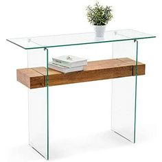 a glass and wood console table with a plant on the top, against a white background