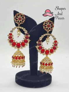 Fall in love with the Aleena Jhumka and its beautiful tyani kundan design! These earrings add a classic touch to any outfit and will surely be a timeless addition to your jewelry collection. Adorn yourself with stunning grace and elegance. LENGTH : 4 inches approx Wedding Temple Jewelry Danglers With Cutdana, Diwali Wedding Temple Jewelry Danglers, Temple Jewelry Danglers For Diwali Weddings, Elegant Kundan Bridal Earrings With Cutdana, Chandbali Jhumkas For Wedding And Navratri, Wedding Chandbali Jhumkas For Navratri, Elegant Bridal Earrings With Kundan And Cutdana, Navratri Kundan Bridal Earrings In Temple Jewelry Style, Kundan Bridal Earrings For Navratri In Temple Jewelry Style