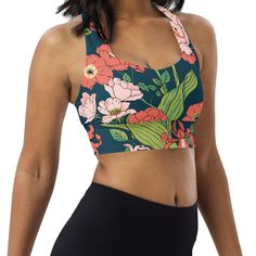 Looking for a swim top or sports bra that's both stylish and functional? Wear alone or under your rashguard! Look no further than the Seychelles Floral Sports Bra Swim Top from Berry Jane. Made in America from a lightweight, peachy fabric, this sports bra is lined for extra support and lightly padded for a comfortable, compression fit. Plus, the mix-and-match print makes it easy to create a unique look for your next beach or paddleboard lake adventure. • Compression fabric: 78% polyester, 22% sp Summer Sports Activewear With Medium Bust Support, Breathable Athleisure Sports Bra For Beach, Multicolor Stretch Activewear Bra Friendly, Beach Athleisure Activewear With Built-in Padding, Fitted Sportswear For Beach, Sporty Fitted Activewear For Beach, Multicolor Moisture-wicking Sports Bra For Yoga, Sporty Swimwear With Medium Bust Support, Functional Moisture-wicking Sports Bra For Beach