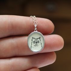 This adorable pendant features a hand drawn image of a Persian cat! It is made with sterling silver and three layers of kiln fired vitreous enamel for a strong, waterproof and vibrant finish. The pendant comes on an adjustable sterling silver chain that can be clasped anywhere between 16 and 20 inches. I ship USPS First Class in a gift box, without a receipt. Shipping upgrades available at checkout. Vitreous Enamel, Cat Breed, Cat Pendants, Persian Cat, Cat Necklace, Sterling Silver Chain, Kiln, Sterling Silver Chains, Silver Chain