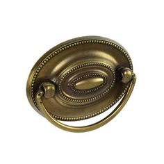 an antique brass door handle on a white background