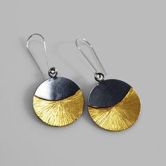 A stunning pair of earrings that hold a beautiful shine and transition from day to night with ease. Made of sterling silver, 14k gold keum boo and finished with a dark patina. Measure: about 2 inches down. Arrives to you in a gift box with foam padding and tissue paper. This item is a special made to order piece. Please allow me at least one week to complete your piece before it is shipped. If you need this item right away or shipped to a different location please contact me. Sterling Silver Dual-tone Earrings For Gift, Dual-tone Round Earrings For Gift, Gold Oxidized Earrings For Gift, Gold Oxidized Finish Earrings For Gift, Keumboo Jewelry, Ancient Korean Art, Surface Embellishment, Keum Boo Jewelry, Keum Boo