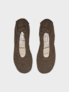 These cashmere ballet slippers have a comfy, cushioned sole and an elastic trim that stays put. Perfect for lounging around the house, pair with our matching robe and eye mask for the most luxurious night's sleep. Details 100% Cashmere. Wipe clean only. Style #20554 Cashmere Robe, Cashmere Travel Wrap, Travel Wrap, Matching Robes, Comfy Slippers, Ballet Fashion, Ballet Slippers, Wrap Cardigan, Wrap Sweater