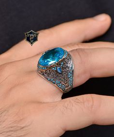 "Turkish Handmade Ring, Aquamarine Gemstone Ring, Ottoman Silver Ring,  925 Sterling Silver Ring, Mens Jewerly, Magnificent Gift ✦ Details ✦ * Material: 925 Sterling Silver * Gemstone: Aquamarine * Weight: 17,00 grams. * The size of the stone: 13x18 mm. * Sides oxidized, decorated with Micro Turquoise stones. * Stamp: 925 * Available sizes; 5 US to 16 US. Contact me if you need any other size! ✦ Shipping ✦ * Processing time: 1-3 business days. * This item ships from my Turkish workshop in Istanbul. * Add your phone number in address box for a smoother delivery. That makes courier personnel's job easier.  ✦ Packaging ✦ * Comes with a luxury gift box and a jewellery cleaning cloth and courtesy gift. ✦ Returns, Exchanges ✦ * Return option available for 30 days after the delivery. * The produc Ottoman Silver, Mens Jewerly, Ring Mens, Turquoise Stones, Luxury Gift Box, Aquamarine Gemstone, Turquoise Stone, Gemstone Ring, 925 Sterling Silver Ring