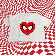 Elevate your style with our cotton crop top featuring a unique Spider Heart Logo inspired by Gwen. Perfect for fans of the Spider-Verse, this trendy top combines comfort with a touch of superhero flair, making it an ideal gift for any Gwen Stacy enthusiast. I send you proof before printing it. If you want Photo & Logo printing, please send it through ETSY messages M A T E R I A L S → 4 oz./yd², 60/40 combed ringspun cotton/polyester, 30 singles → Retail fit → Set-in 1x1 baby rib collar and cuffs White Tops With Pop Culture Character Print, White Pop Culture Tops With Character Print, Red Cropped Cotton T-shirt With Graphic Print, White Pop Culture Character Print Tops, Red Cotton Cropped T-shirt With Graphic Print, Fun White Top With Heart Graphic, White Pop Culture Tops With Cartoon Print, Casual Halloween Graphic Print Crop Top, White Pop Culture Top With Cartoon Print