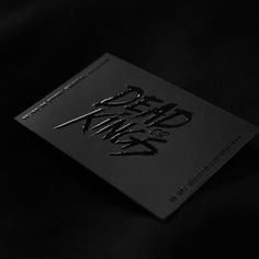 a black and white photo of some type of business card