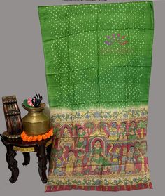 Hand Painted Bandhani Tussar Silk Saree, adorned with hand-painted designs with fine hand strokes.. Crafted with premium Tussar fabric and colored with natural dyes, it's sustainable and luxurious. Complete with fall and pico, and a fully stitched blouse, this saree is ready to flaunt your style with grace. Product: Hand painted bandhani Tussar Silk Saree Saree Color: green Saree Fabric: Pure Tussar colors may be slightly different because of the lighting,and  shades Transitional Green Slub Silk Dupatta, Traditional Art Silk Saree With Batik Print, Traditional Batik Print Wear For Festivals, Bollywood Style Traditional Wear With Batik Print In Chanderi, Traditional Festival Wear With Batik Print, Festival Batik Print Saree, Green Tussar Silk Dupatta For Navratri, Transitional Green Bandhani Print Dupatta, Festive Traditional Wear With Batik Print For Diwali