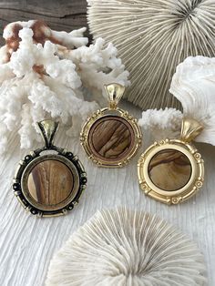 Are you looking for a unique piece of jewelry that is sure to make a statement? Our Natural Picture Jasper Stone Pendant with Zinc Alloy Bezel is the perfect choice! This pendant is available in three bezel colors: matte gold, gold, or bronze. Plus, it is lead and nickel safe, so you can wear it with confidence.  FEATURES: 💎 Natural Picture Jasper Pendant: This beautiful pendant features a natural Picture Jasper stone encased in a Zinc Alloy bezel.  💍 Variety of Colors: Choose from matte gold, Lace Agate Stone, Natural Picture, Stone Pictures, Cabochons Stones, Brass Charms, Jasper Pendant, Picture Jasper, Crazy Lace Agate, Jasper Stone