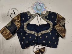 Material: 70 grams Silk, Net. Blouse Size: Can be customized as per your size. Color customization is available. For more details contact us on support@akruticollections.com or WhatsApp +91 9052550550 Price may vary depending on the fabric selection. Elegant Embroidered Top With Traditional Drape, Elegant Embroidered Top With Traditional Drape For Festive Occasions, Elegant Embroidered Top For Designer Festivals, Traditional Elegant Top With Intricate Embroidery, Elegant Tops With Traditional Drape For Reception, Elegant Embroidered Top For Designer Wear And Festive Occasions, Elegant Embroidered Top For Festive Designer Wear, Elegant Embroidered Top With Zari Work And Traditional Drape, Elegant Embroidered Top With Zari Work For Festivals