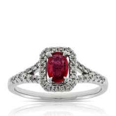 Oval ruby gemstone ring with 1/3 carat total weight of diamonds, in 14K white gold. Oval Ruby Cluster Ring With Diamond Accents, Oval Diamond Ring With Lab-created Ruby Accents, Red Oval Diamond Ring With Accents, Oval Ruby Birthstone Ring With Diamond Accents, Oval Red Diamond Ring With Accents, Oval Ruby Ring With Diamond Accents For Promise, Oval Lab-created Ruby Diamond Ring In White Gold, Self Gift, July Birthstone Ring