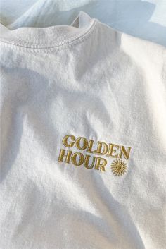 Golden hour, best hour.   The perfect t-shirt to match your next sunset by the sea.  100% CottonEmbroidered on front left side and on sleeveComfort Colors TeeUnisex + Relaxed Fit Small:  Chest 18.5" Length 27"Medium: Chest 20.5" Length 28.5"Large: Chest 22.5" Length 30"X-Large: Chest 24.5" Length 31.5"XX-Large: Chest 2 Graphic Tshirt Women, Minimal Graphic Tee, Branded Tshirt Design, T Shirt Product Photography, Trendy Merch, Golden Shepherd, Graphic Tees Trendy, Business Tshirt, Sunset By The Sea