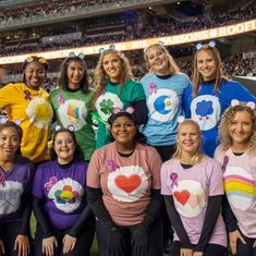 the cheerleaders are posing for a group photo