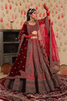 This Lehenga Choli is Ready to Wear A stunning lehenga with beautiful Heavy Sequins, diamond and Zari work, dupatta and lehenga, designed especially for wedding season. Type : Bridal Lehenga Choli Style : A-Line Occasion: Festival Wear, occasion Wear, Party wear Festival: Diwali, Navratri, Pongal, Ugadi etc. Color: Lehenga – Rani Color, Blouse – Maroon & Rani Color, Dupatta – Rani & Maroon Color Fabric : Lehenga – Velvet, Blouse – Velvet, Dupatta – Net & Velvet. Work: Lehenga – Sequins, diamond Heavy Traditional Drape Dupatta For Festive Occasions, Festive Heavy Dupatta In Traditional Drape, Festive Heavy Traditional Dupatta, Heavy Red Dupatta With Traditional Drape, Traditional Heavy Lehenga With Traditional Drape, Heavy Anarkali Dupatta With Traditional Drape, Festive Semi-stitched Heavy Lehenga, Festive Heavy Traditional Drape Choli, Festive Heavy Traditional Drape Sets