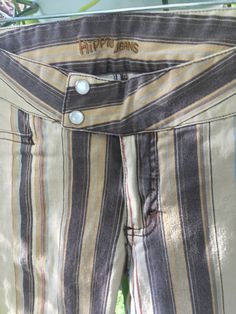 "The ultimate pair of low rise fit & flair blue striped rocker pants by Hippie Jeans for the upcoming concerts & music festivals! 97% cotton and 3% spandex for stretch.  Waist 27\"  Low Rise 7 1/2\" from waistband to crotch It's getting more and more difficult to find outstanding vintage pieces these days however Janet Planet has them in spades!" Striped Bell Bottoms Outfit, Janet Planet, Stripe Pants Outfit, 90s Sport, Low Waisted Pants, 70s Pants, 90s Pants, Hippie Jeans, Funky Pants