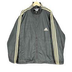 Vintage Adidas Zip Up Jacket Sportswear Black With White Stripes Size Large * Made in : Japan  * Size on Tag : Large (L) * Manual Measurement (inch) : Chest 24, Length 31, Shoulder 25, Sleeve 22, Hem 24. * Suitable for Size : L * Material : Nylon, Polyester. * Color : Black * Condition : Good Used * Free Defect : No Stain, No Holes, No Tears, No Faded. NMB 09 Vintage Black Windbreaker For Outdoor Activities, Vintage Black Windbreaker For Winter, Retro Black Windbreaker For Outdoor Activities, Retro Black Sports Outerwear, Retro Black Windbreaker For Outdoors, Retro Black Windbreaker For Outdoor, 90s Style Sports Windbreaker For Fall, Vintage Nylon Sports Outerwear, 90s Style Fall Sports Windbreaker