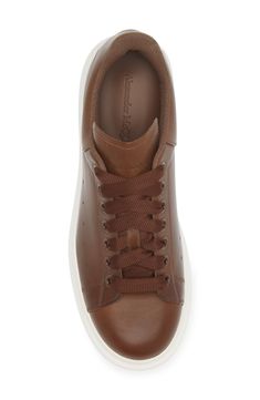 A chunky rubber platform elevates this lace-up sneaker with a removable, padded insole that provides signature comfort. 1 1/2" heel, 38mm (size 43MI) Lace-up style Removable, cushioned insole Leather upper/textile and leather lining/rubber sole Made in Italy Designer Shoes Luxury Low-top Sneakers With Laces, Sporty Lace-up High-top Sneakers In Calf Leather, Casual Lace-up Calf Leather Custom Sneakers, Medium Fit Lace-up Sneakers With Rubber Sole, High-top Lace-up Sneakers With Medium Fit, Luxury High-top Lace-up Sneakers With Boost Midsole, Low-top Calf Leather Platform Sneakers For Streetwear, Calf Leather Low-top Platform Sneakers For Streetwear, High-top Sneakers With Medium Fit