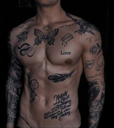 a man with many tattoos on his chest