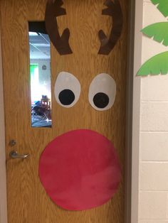 a door decorated to look like a reindeer