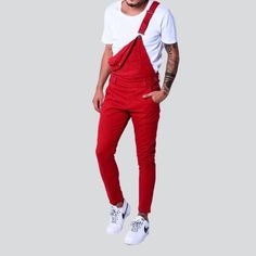 Be on-trend this spring-summer season with our 2023 Collection's Skinny Color Men's Denim Jumpsuit ââ‚?the perfect combination of urbane style and sophistication!Why You'll Love ItThis jumpsuit will make you stand out from the crowd with its unique details. It is made from stretchy fabric and features color-contrasting suspenders and buttons closure. The sleek slim fit type is designed to hug your form while looking stylish and feeling informal.Key Highlights: Statement Piece: Make a bold fashio Solid Cotton Denim Jumpsuit For Summer, Summer Cotton Denim Jumpsuit, Fitted Cotton Overalls In Solid Color, Fitted Summer Overalls For Streetwear, Casual Red Cotton Jumpsuits And Rompers, Fitted Denim Jumpsuit For Spring Streetwear, Casual Fitted Solid Color Overalls, Casual Fitted Cotton Overalls, Fitted Casual Overalls In Solid Color