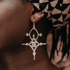 These lovely African jewelry inspired berber cross earrings in silver are handmade using traditional jewellery technique and Tuareg jewellery carving techniques.  These tribal earrings are inspired by the Tuareg's South cross also called the Agadez Cross. This jewellery have been used by the Tuareg nomadic tribe to navigate in the dessert. The cross has different meanings, one of them being that the arms of the cross will disperse all evil from the individual, thus keeping him out of harms way. Ethiopian Jewelry Traditional, Heavy Silver Bohemian Earrings, Spiritual Oxidized Silver Earrings, Berber Earrings, Afro Jewelry, Amazigh Necklace, Carving Techniques, Ethiopian Jewelry, Berber Jewelry Morocco