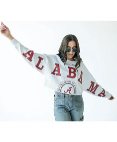 Gameday Social's Cropped Long-Sleeve Crewneck is a GDS favorite featuring a raw hem, dropped shoulder, and the perfect lightweight material. It fits like a dream and adds a girly touch to your collegiate wardrobe. Pair it with denim shorts and cowboy boots for game day! True to Size ScreenPrint 60% Cotton | 40% Polyester Oversized White Sweatshirt For Campus, White College Style Tops With Ribbed Cuffs, College Style White Tops For Fall, White College Style Tops For Fall, Spring Long Sleeve Tops For Game Day, Spring Varsity Top For Campus, Spring Collegiate Tops With Ribbed Cuffs, White Varsity Top For Spring, Collegiate Style Top With Ribbed Cuffs For Spring