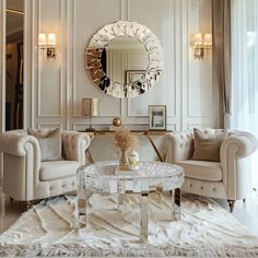 a living room filled with furniture and a large mirror on the wall above it's coffee table