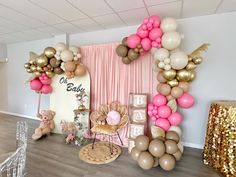 a room filled with balloons and teddy bears