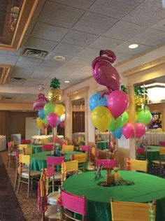 tables and chairs are set up for a party