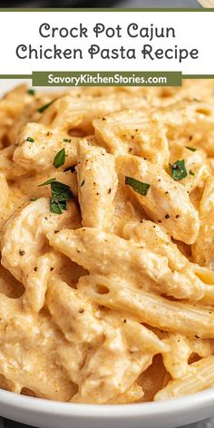 a white bowl filled with chicken pasta and garnished with parsley