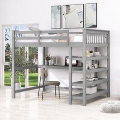 a loft bed with desk underneath it in a white room next to a couch and chair