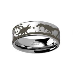 a wedding band with dinosaur silhouettes and palm trees inlayed to the side